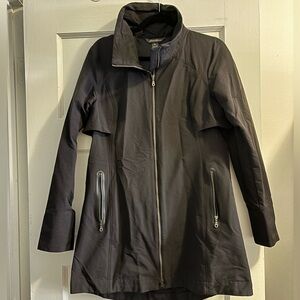 Eddie Bauer Size M. Black stretch shell jacket. Trench style with zipper.